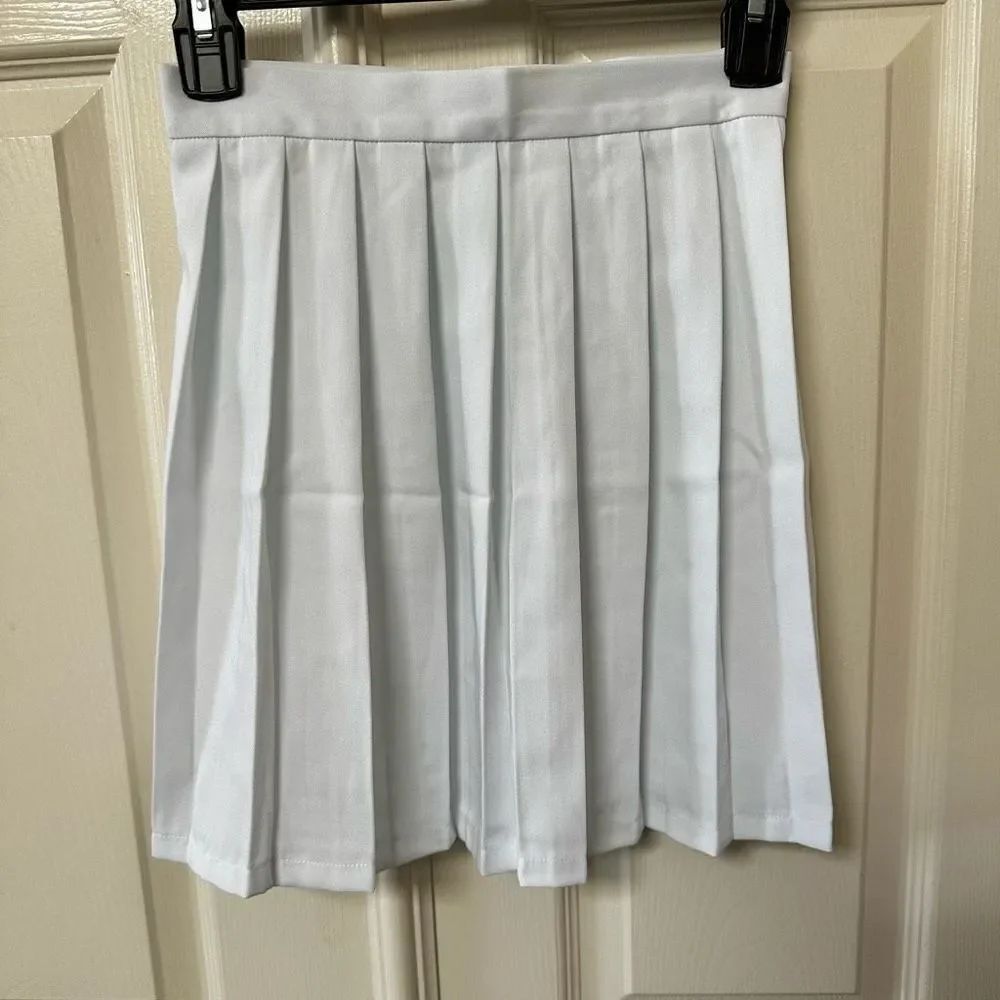 White pleated skirt